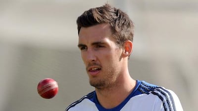 England's Steve Finn bowls during a practice session at the Dunedin University Oval in New Zealand.