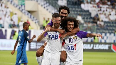 Marcus Berg, left, scored a hat-trick for Al Ain as their 4-0 win over Al Nasr secured the Arabian Gulf League title. Pawan Singh / The National