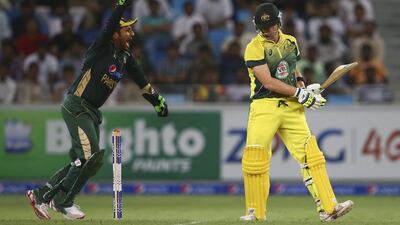 Sarfraz Ahmed of Pakistan celebrates after dismissing Steve Smith of Australia during the second match of the one day international series between Australia and Pakistan at Dubai Sports City Cricket Stadium on October 10, 2014 in Dubai, United Arab Emirates. Francois Nel/Getty Images