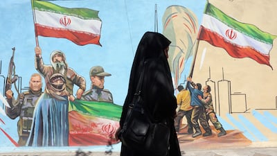 A street mural spreads the regime's message in Tehran. Optimism over a deal with the US was reinforced by Iran's announcement that a funeral procession for late supreme leader Ali Khamenei will be held later this month. EPA