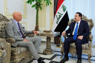 Iraqi Prime Minister Mohammed Shia Al Sudani, right, with the US President's special envoy Tom Barrack. AFP