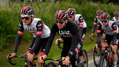 Slovenia's Tadej Pogacar center, rides with teammates during a training, outside Brest, western France, on Thursday, ahead of Saturday's start of the Tour de France. AP
