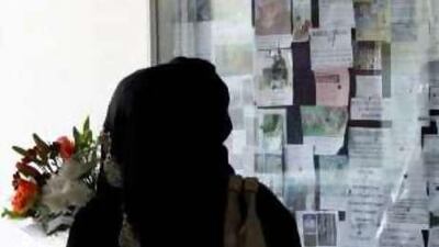 A shopper looks at the customer notice board at a supermarket in Abu Dhabi.