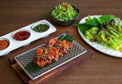 Grilled meat mains are served with fiery dipping sauces and oils. Photo: Hoe Lee Kow