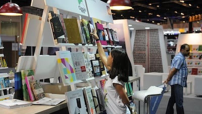 Sara Elgiziry, 11, browses the many books available at last year’s Abu Dhabi International Book Fair at Adnec. Delores Johnson / The National