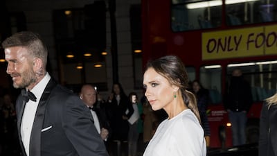 David and Victoria Beckham, wearing her own label, attend a gala at National Portrait Gallery on March 12, 2019. Getty Images