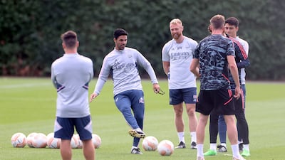 Arsenal manager Mikel Arteta oversees training at London Colney. PA