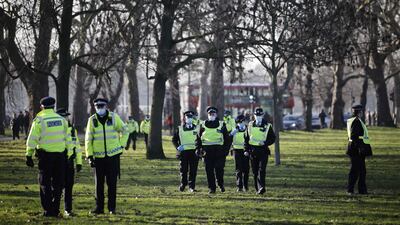 Police officers patrol in Clapham Common in south London. AFP