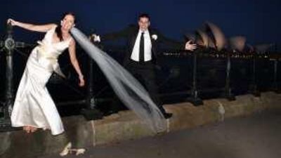 From the Great Barrier Reef to Sydney Opera House, Australia has a vast array of beautiful backdrops for weddings. Above, Anna Morris and Nicholas Patsiouras frolic, with the opera house in the background, after their marriage late last month.