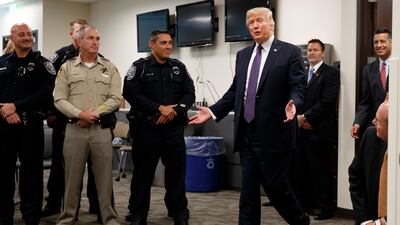 President Donald Trump arrives to meet with first responders at the Las Vegas Metropolitan Police Department in Las Vegas. Evan Vucci / AP Photo