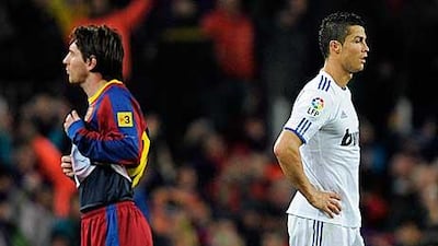 Cristiano Ronaldo, right, and Lionel Messi were worlds apart in Barcelona's 5-0 thrashing of Real Madrid.