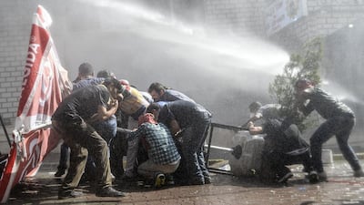 Tensions across Turkey are high, with police routinely using water cannons to disperse nightly protests in Istanbul and other cities denouncing ISIL and the government's policies on Syria. Bulent Kilic/AFP Photo