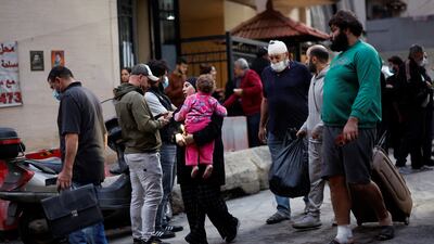 Residents flee Basta with few belongings. Reuters