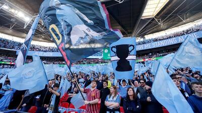 Manchester City fans celebrate winning the League Cup final at Wembley last month. Reuters