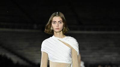 A model walks the runway during the Dior Cruise show 2022 at Panathenaic Stadium on June 17, 2021 in Athens, Greece. Getty Images
