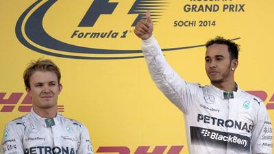 Lewis Hamilton, right, leads Mercedes teammate Nico Rosberg, left, by 17 points in the F1 drivers' standings. Alexander Nemenov / AFP / October 12, 2014
