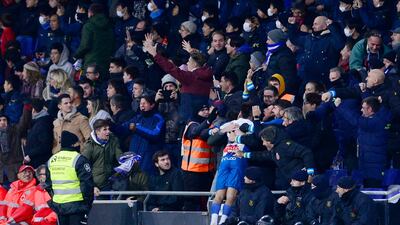 Espanyol's Argentinian midfielder Matias Vargas celebrates with fans. AFP