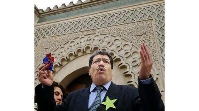 Abderahmane Dahmane, a former adviser to France's president, Nicolas Sarkozy, says a planned debate on the role of secularism in France should be cancelled.