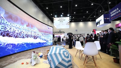 President Moon Jae-in listens to a presentation on Busan's efforts to bid for the 2030 World Expo during a visit to the Expo 2020 in Dubai. EPA