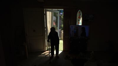 Ms Helmy at the entrance of her houseboat. The removal of the boats has drawn criticism in Egypt.