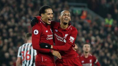 Liverpool's Fabinho celebrates scoring their fourth goal with Virgil van Dijk. Action Images via Reuters
