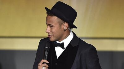 Barcelona and Brazil’s forward Neymar speaks on stage during the 2015 FIFA Ballon d'Or award ceremony at the Kongresshaus in Zurich on January 11, 2016. Fabrice Cofrini / AFP