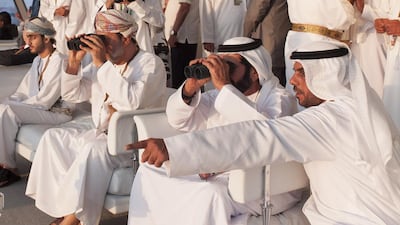 Sheikh Tahnoon bin Mohammed Ruler's Representative of the Eastern Region (2nd R), Sayyid Haitham Bin Tariq Minister of Heritage and Culture of Oman (3rd R) and other guests attend the final race of the 2013 Formula 1 Etihad Airways Abu Dhabi Grand Prix, at Yas Marina Circuit. Crown Prince Court - Abu Dhabi