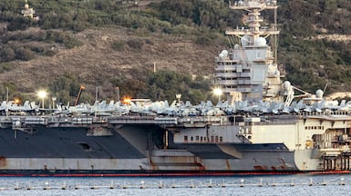 American aircraft carrier the USS Gerald Ford puts in at Souda Bay on the Greek Mediterranean island of Crete. One of the world's largest military vessels, the Ford and its battlegroup are travelling the Middle East to support the carrier USS Abraham Lincoln, which arrived last month, on possible Iran operations. AFP