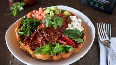 Entrée: Tacos de pollo: grilled corn-fed chicken, onion, cilantro and taqueray sauce; Dh30 from Loca