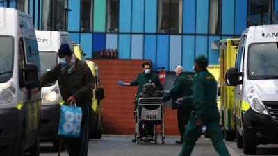 Paramedics wheel a patient into The Royal London Hospital. Getty Images