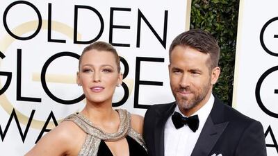 Blake Lively, left, and Ryan Reynolds arrive for the 74th annual Golden Globe Awards ceremony. Paul Buck / EPA