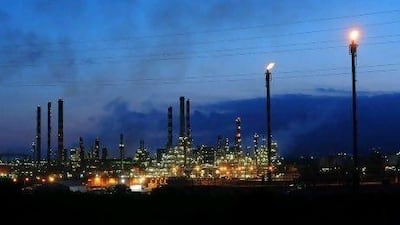 Lights illuminate the Repsol YPF SA oil refinery in Tarragona, Spain. Bloomberg News