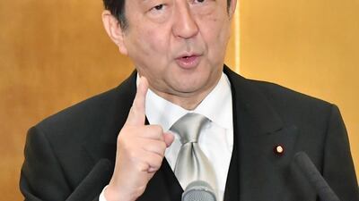 Japanese Prime Minister Shinzo Abe has urged central bank governor Haruhiko Kuroda to keep up efforts to reflate the economy, Yoshiaki Sakamoto / Kyodo News via AP.