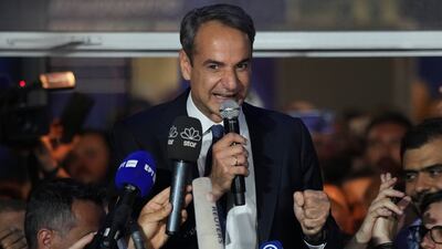 Greek Prime Minister Kyriakos Mitsotakis addresses supporters at the headquarters of his party in Athens on May 21. AP