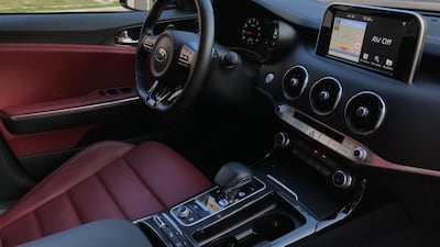 The Kia Stinger comes with a colour-co-ordinated interior. Adam Workman / The National