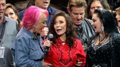 Lynn with Tanya Tucker and Crystal Gayle at Lynn's 87th Birthday Tribute in Nashville. Invision / AP