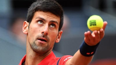 Serbia’s Novak Djokovic serves a ball to Britian’s Andy Murray during the Madrid Masters men’s tennis final at the Caja Magica (Magic Box) sports complex in Madrid on May 8, 2016. Gerard Julien / AFP
