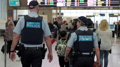 Australia Federal Police officers patrol the security lines at Sydney's Domestic Airport in Australia on July 31, 2017 following weekend raids related to a plot against Australia's aviation sector. Reuters / Jason Reed