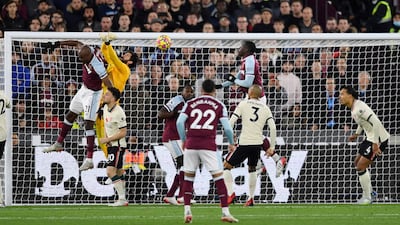Liverpool's Alisson scores an own goal. Reuters