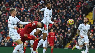 Alex Oxlade-Chamberlain heads the ball to score Liverpool's second goal. AFP