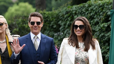 Tom Cruise and Hayley Atwell attend day 12 of the Wimbledon Tennis Championships.