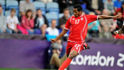 Mohamed Fawzi of United Arab Emirates kicks the ball. Getty Images