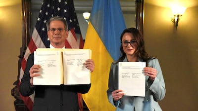 US Treasury Secretary Scott Bessent and Ukrainian First Deputy Prime Minister and Economy Minister Yulia Svyrydenko after signing the mineral deal in Washington. Reuters