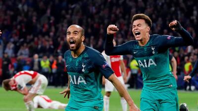 ottenham's Lucas Moura, left, celebrates scoring their third goal to complete his hat-trick with Dele Alli. Reuters