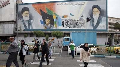 A mural of Iranian supreme leader Ayatollah Ali Khamenei, left, and late leader Ayatollah Ruhollah Khomeini, in Tehran. Last month, Iran and Israel directly attacked each other's territory for the first time.
