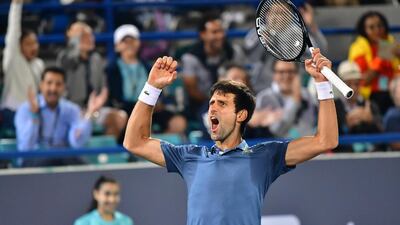 Novak Djokovic celebrates his victory during the 2018 Mubadala World Tennis Championship final. AFP