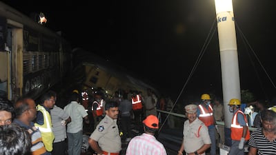 A passenger train slammed into a stationary train, leading to derailment of at least three carriages. AP