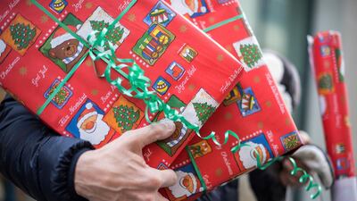 For every dollar spent on gifts, around 30 per cent is wasted. Sebastian Gollnow / AP Images