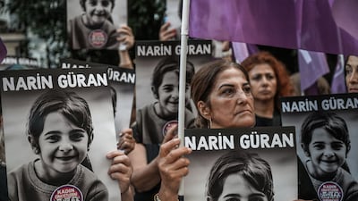 Protesters hold portraits of Narin Guran in Istanbul, in September. AFP