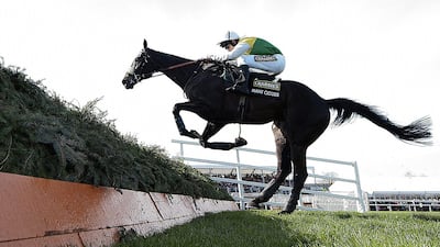 Many Clouds starts over the final jump to carry jockey Leighton Aspell to his second Grand National title in as many years, denying British champion jockey Tony McCoy. Peter Powell / EPA